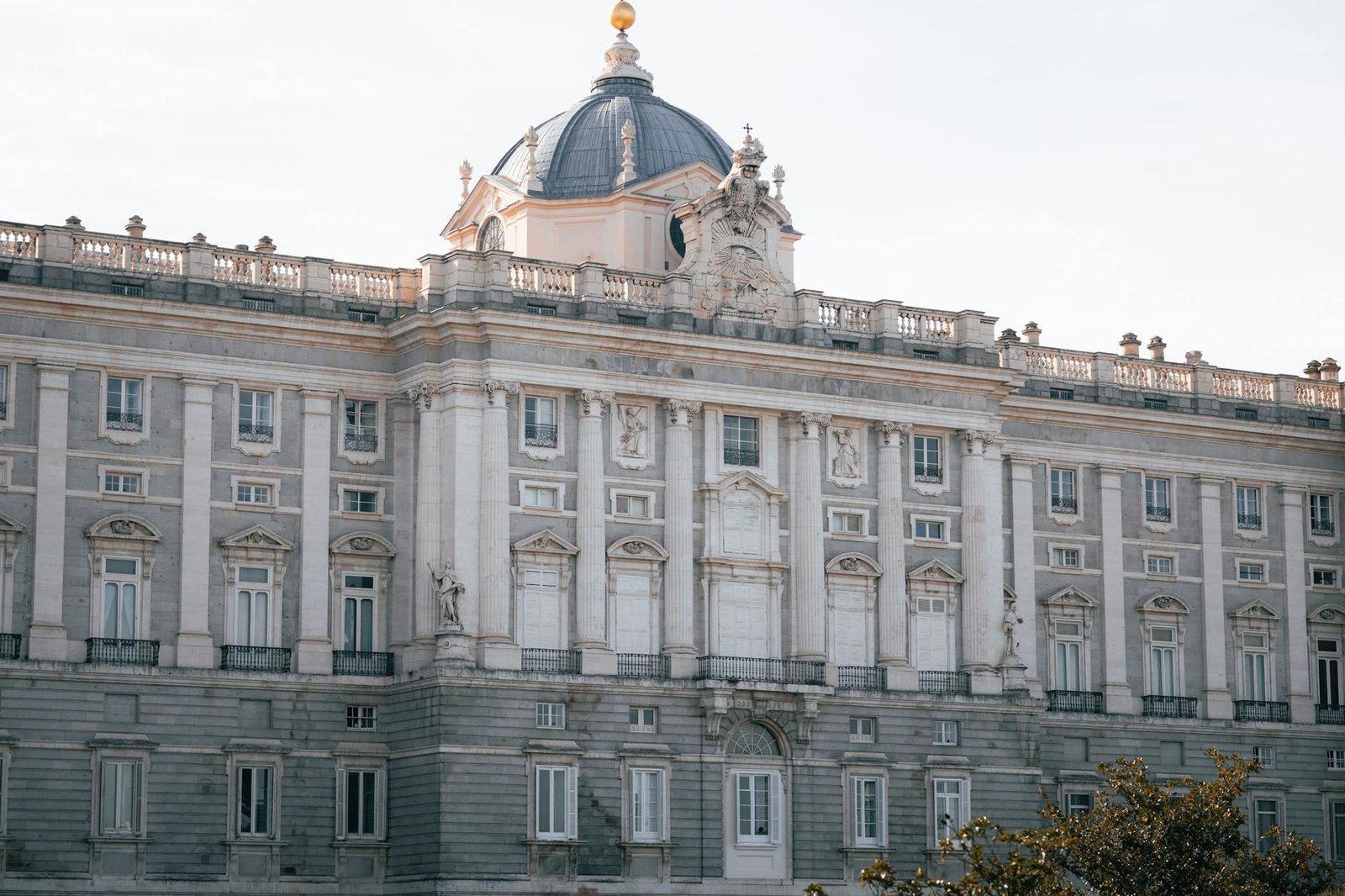 Close-up of the Royal Palace of Madrid. Captivating facade in soft daylight, showcasing classic architecture.